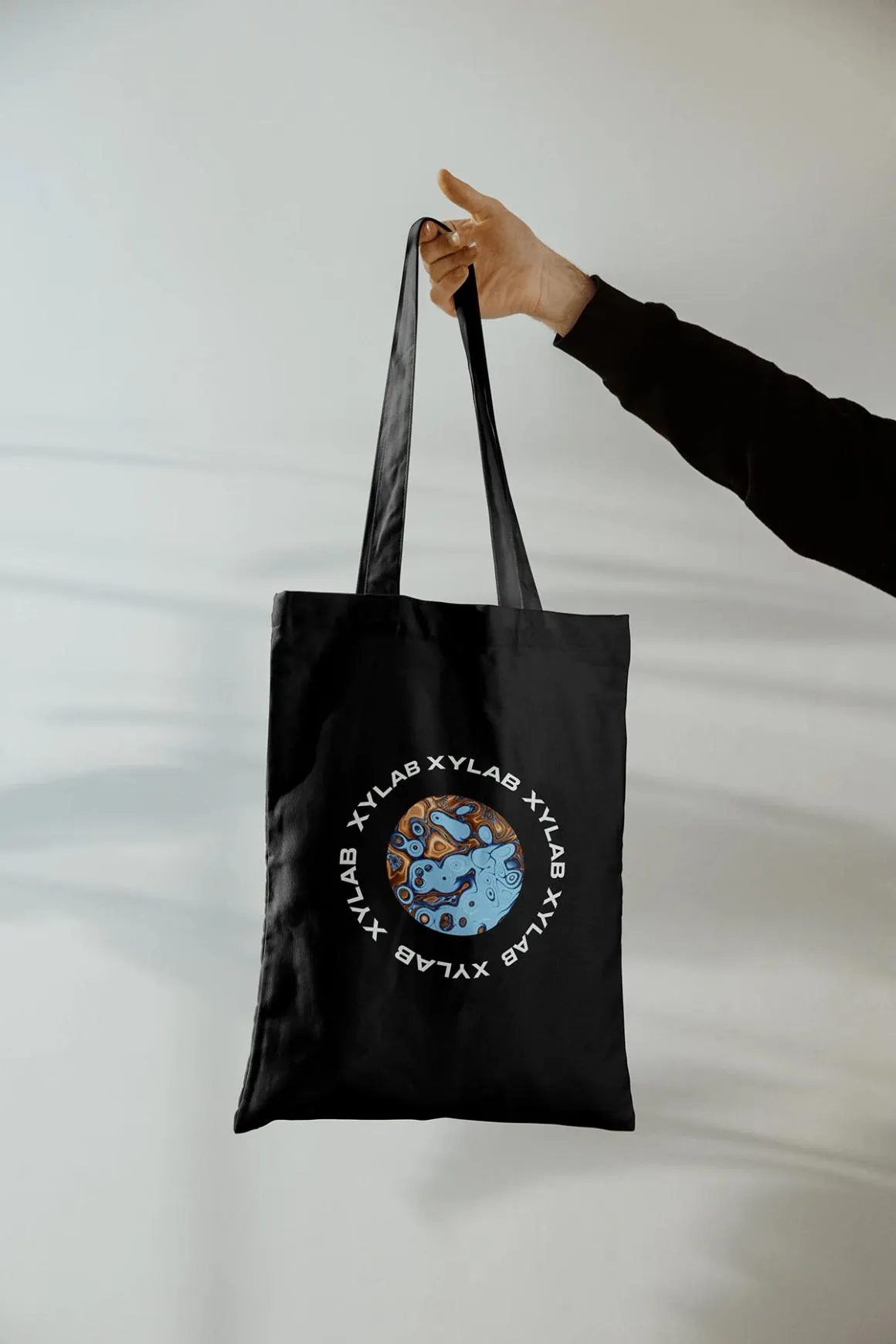 XYLAB tote held